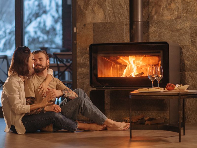 Outdoor cooking over open fire with cast iron cookware